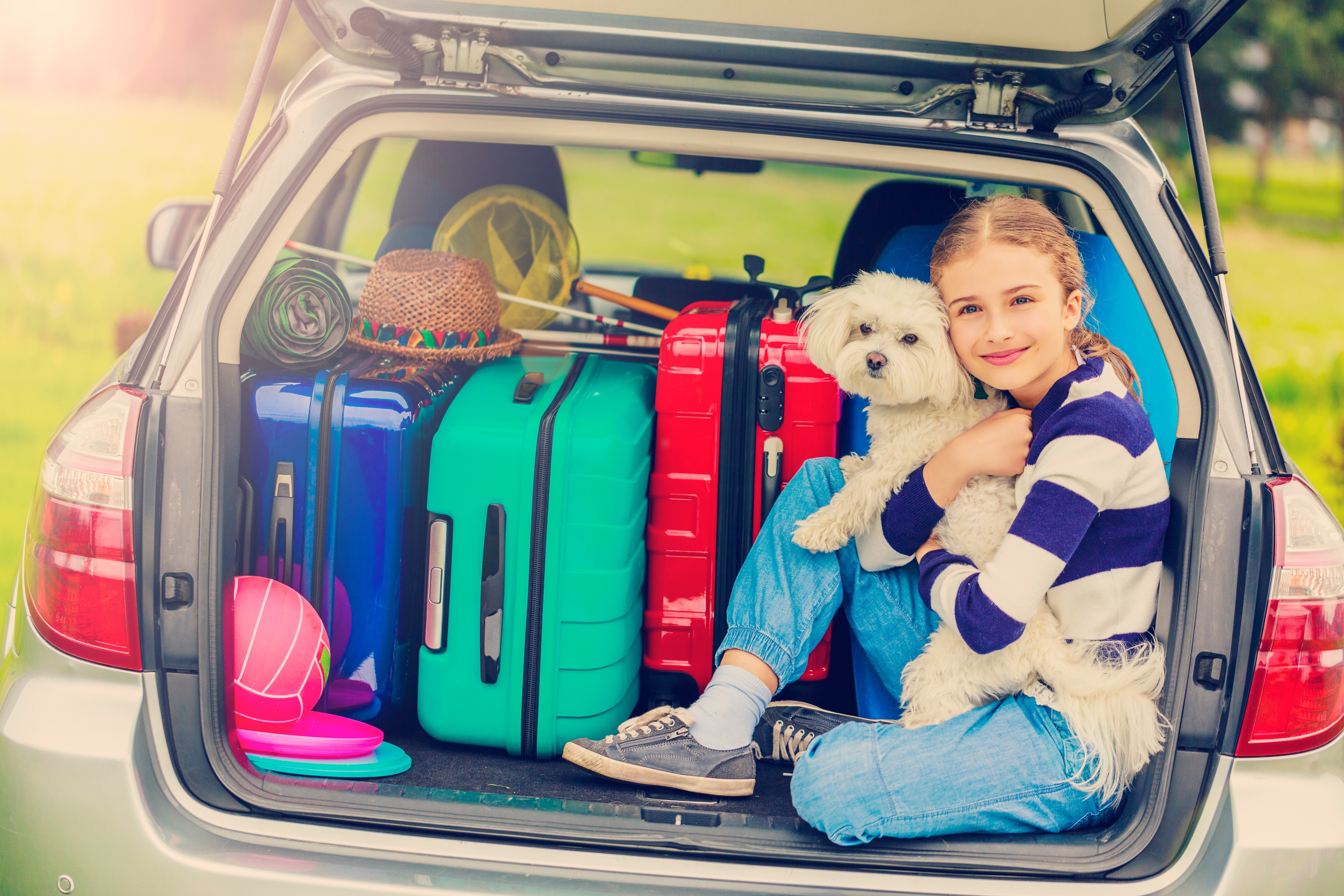 Summer vacation, young girl ready for travel
