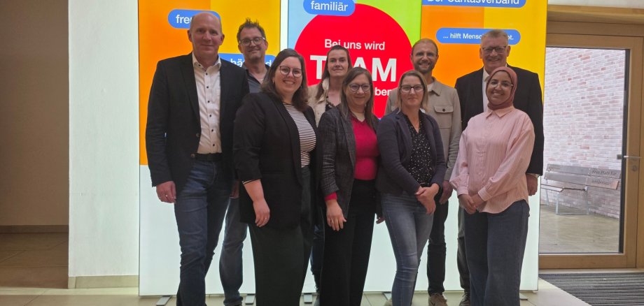 Vertreter des Caritas-Verbandes gemeinsam mit Mitarbeitenden des jobcenter Kreis Steinfurt